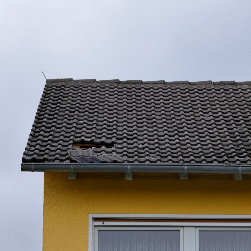 Roof shingles blown off 