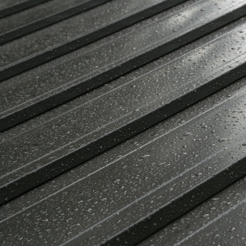 raindrops on a corrugated metal roof